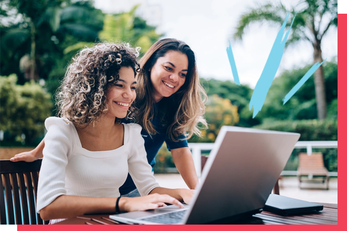 Student at laptop with parent