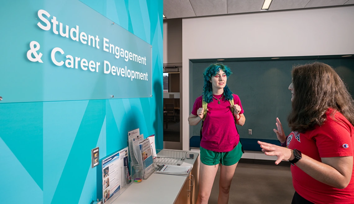 Two students talking at the student engagement and career development center